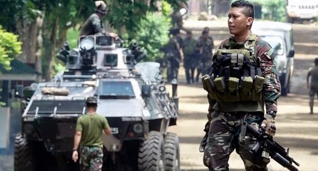 At least 21 killed as Isis-linked militants rampage through Philippines city